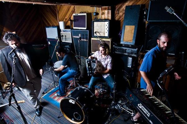 Band rehearsal — amps, drums, and good company